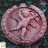 pannello ovale putto con arco a rilievo